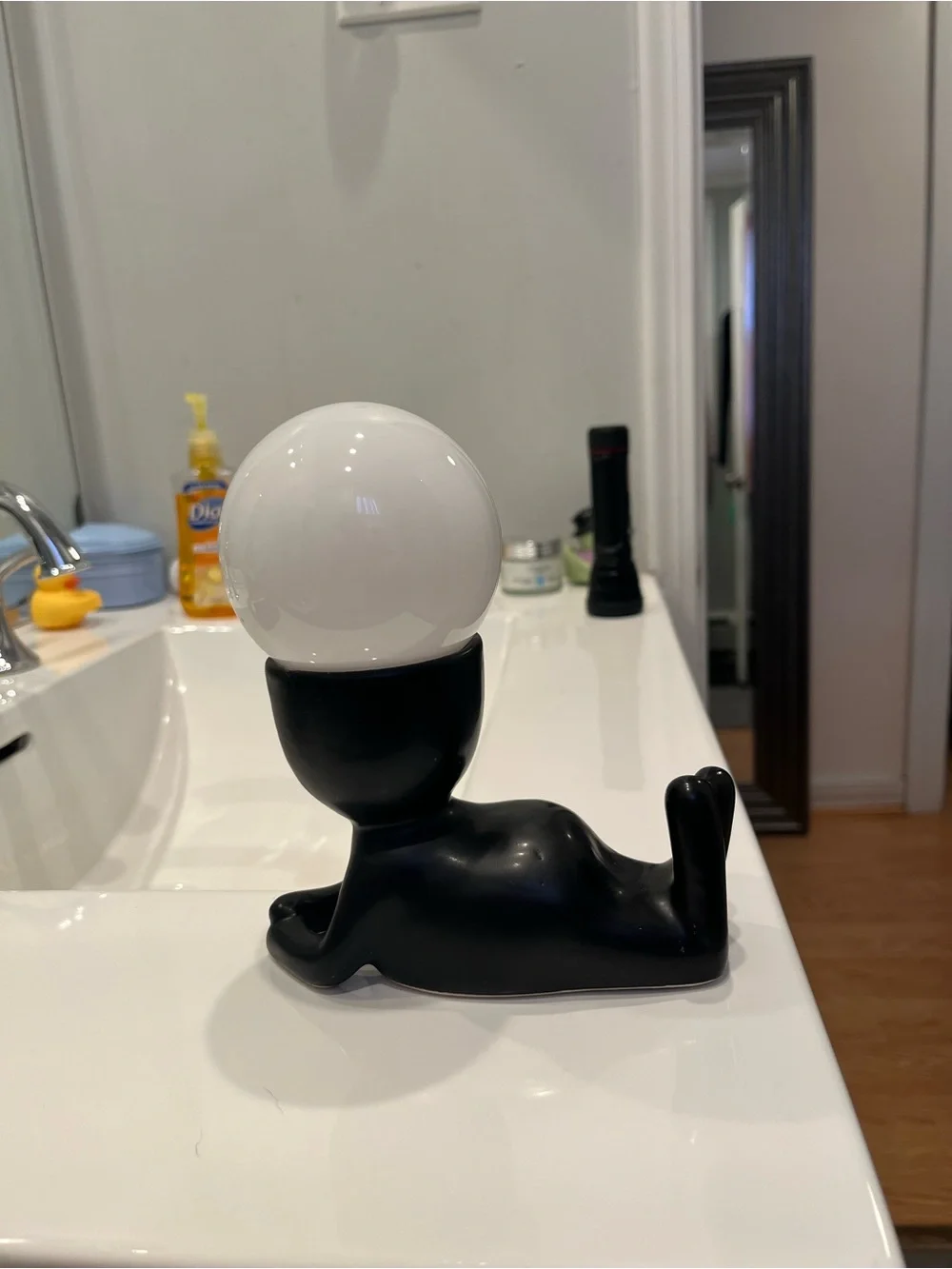 Black Figural Table Lamp with White Globe